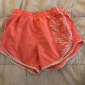 NIKE CORAL RUNNING SHORTS